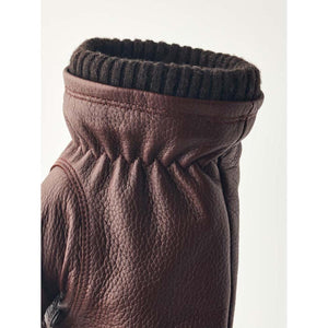 Brown Hestra leather glove cuff with ribbed knit trim