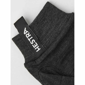 Dark grey Hestra glove cuff with branded pull tab