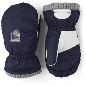 Hestra navy blue mittens with white leather palm details and grey ribbed cuffs