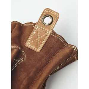 Hestra brown leather glove cuff detail with metal eyelet