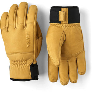 Hestra tan leather gloves with black cuffs and velcro wrist straps