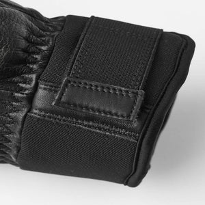 Hestra black leather glove cuff with adjustable velcro strap
