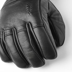 Black Hestra leather glove with embossed logo