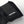 Black Hestra glove cuff with adjustable velcro strap and white brand logo