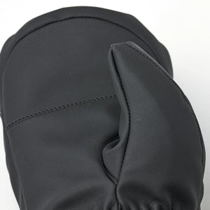 Close up of black Hestra leather mitten thumb detail