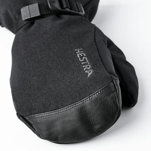 Black Hestra mitten with leather palm and adjustable wrist strap