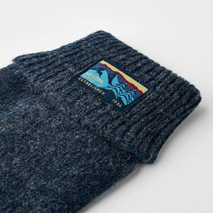 Hestra navy blue ribbed knit wool glove with mountain graphic patch