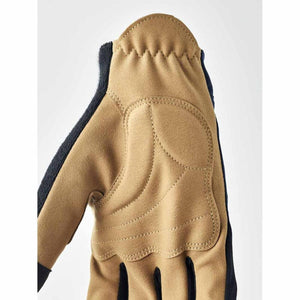 Tan Hestra glove palm with reinforced stitched padding