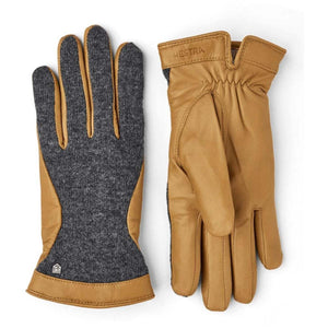 Hestra gloves featuring grey wool knit backs and tan leather palms