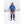 Skier wearing blue jacket and beanie holding Hestra red gloves in snowy landscape