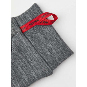 Grey Hestra glove cuff with red branded pull tab