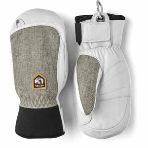 Hestra white and grey leather mittens with black cuffs and carabiner attachment