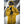 Person wearing a yellow jacket and Hestra black gloves in a snowy mountain environment