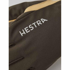 Close up of Hestra glove fabric with brand logo