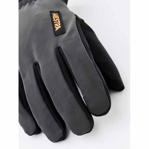 Hestra black glove with grey accents and brand label