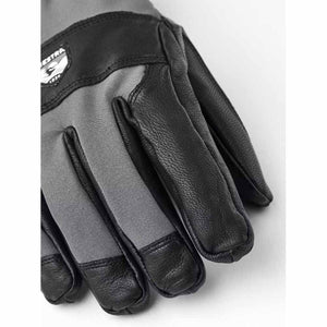Hestra black and grey leather glove with brand logo patch