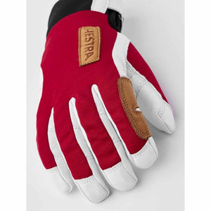 Hestra red and white leather ski glove with brand patch