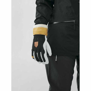 Hestra black and white leather ski glove with yellow cuff detail