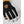 Hestra glove with black fabric back white leather fingers and tan leather cuff detail