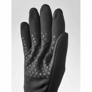 Hestra black fleece glove with textured grip pattern on palm and fingers