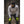 Person wearing Hestra neon yellow gloves and athletic gear outdoors
