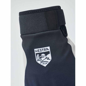 Close up of Hestra glove cuff with brand logo