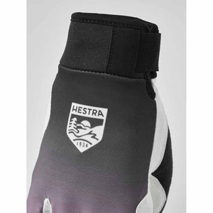Hestra glove with black and white gradient fabric and Hestra logo patch