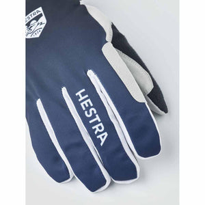 Hestra navy blue glove with white logo and trim