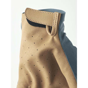 Hestra glove cuff with tan perforated material and velcro closure