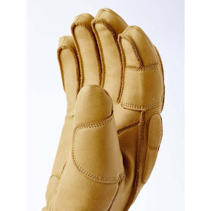 Tan Hestra leather glove showing palm and thumb detail