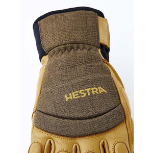 Hestra tan leather and brown fabric glove back detail