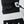 Black and white Hestra ski glove with adjustable drawstring cuff and embossed logo