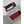 Close up of a Gore-Tex Infinium label on a red white and grey glove cuff