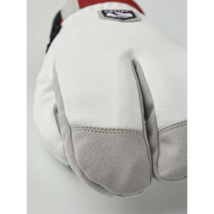 White and grey split finger ski glove with Hestra brand patch