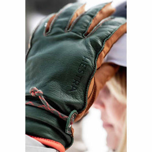 Hestra green and tan leather glove with drawstring closure