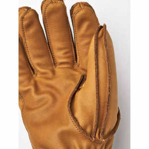 Hestra tan leather glove showing thumb and finger detail