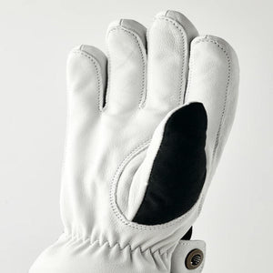Hestra white leather glove with black thumb patch