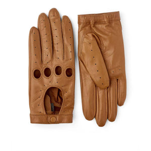 Hestra tan leather driving gloves with knuckle cutouts and perforated detailing