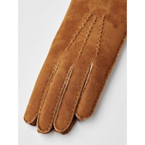 Hestra brown suede leather glove with decorative stitching on the back