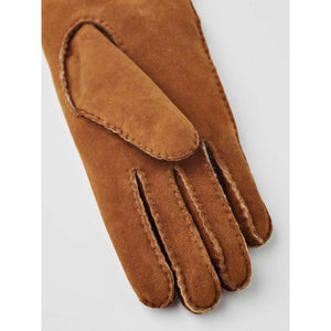 Hestra brown suede glove with visible stitching