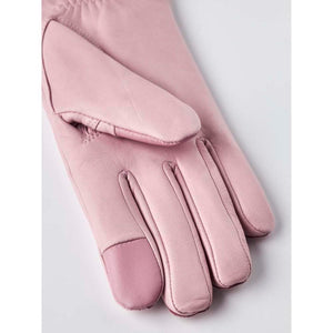 Close up of a pink leather glove showing the palm and finger detail