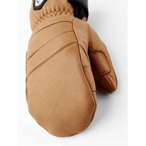 Tan leather Hestra mitten with black wrist cuff