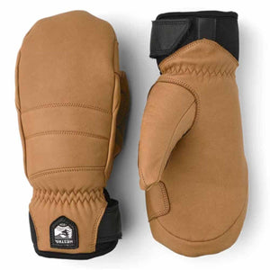 Hestra tan leather mittens with black cuffs and wrist straps