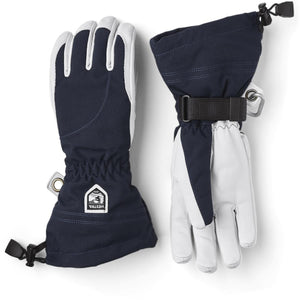 Hestra navy and white leather ski gloves with adjustable wrist straps and drawcord cuffs