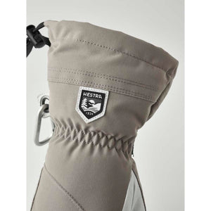 Grey Hestra mitten cuff with drawstring and logo patch
