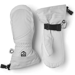 Hestra white ski mittens with black wrist straps and logo patch
