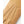 Tan leather glove with three rows of decorative stitching on the back