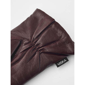 Hestra dark brown leather glove with gathered wrist detail and Viska brand label