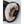 Brown leather glove interior with cream colored lambfur lining and material tag