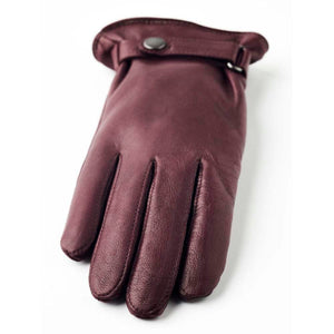 Hestra burgundy leather glove with snap button closure